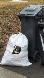 These special bags are to be used after the new regulation comes into effect, and only for additional garbage beyond what can fit in the grey bin. (LR) Photo: Lily Ryan
