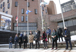Photo caption: On March 11, Gatineau’s elected officials gathered at the Maison du Citoyen in Hull, where flags were held at half-mast, to hold a minute of silence to commemorate COVID-19 victims and their families. Photo: Courtesy of the city of Gatineau