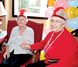 Celebrating 100th birthday, Elisabeth Peterse-Debooy (left) 
Photo: William Pryor