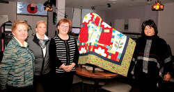 Far left, Elizabeth Couture, middle, Rose Regimbald, next is Jocelyn Gara, designer of the quilt, far right Lillian Beaudoin (Founder, Aylmer Circle of Friends). 
Photo: W. Pryor