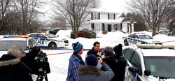 Police outside the home of Thérèse Gauvreau, January 19. 
Photo: William Pryor