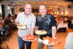 Patrice Provost and Guy Leblanc at the Optimist Club Seafood Feast fundraising dinner, June 2. Photo: Lily Ryan