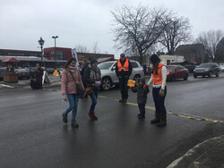 Local residents take matters into their own hands with an improvised cross walk on the corner of Principale and Neil O’Donnell to illustrate the need for safe pedestrian crossing, March 31. Photo: Joanne Zalera