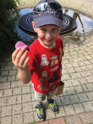 Little Bennet Bruce Poliquin was incredibly happy to find this pink painted stone in the Farmers’ Market area. 
Photo: Noelle Bruce