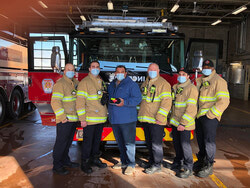Michel Raymond, and Michel Matthews, Captain of the Service de Sécurité incendie, and the firefighters at the Gatineau Caserne de Pompiers #1 in Aylmer