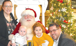 The D’Aoust family meets Santa, December 9 at the Gatineau Golf Club. 
Photo: William Pryor