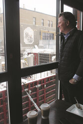 Photo caption: Preparing to host a grand opening event in February of 2022, British Hotel and Café owner Mike Clemann feels excited about his British Square residential project and its expected impact on the neighbourhood. Photo: J-D Potié