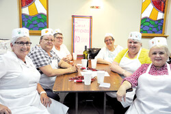 The Knights of Columbus team resting before gearing up for another round in the May 14 fundraising game night with Circle of Friends.
(LR) 

Photo: William Pryor