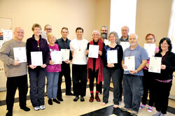 Blaise T. Ryan (centre) with new qigong instructors (from left) Rick Wedge, Diana Durnford, Nicolas Hanssens, Monique Massé, Marc-André Blanchard, 
Violette-Lise Duguay, Daniel Aarons, Naomi Sparrow, Serge Picard, François Leblanc, Bernadette Murray, Arlene Cybulskie. They were certified in Aylmer on 
March 26, after completing a six-month, 200-hour teacher training, given by Mr Ryan, Aylmer resident and local qigong and tai chi teacher.
Photo: William Pryor