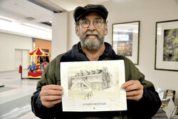 Aylmer artist Gary Martineau has created 
a calendar of Aylmer 
heritage buildings that 
he is selling prior 
to Christmas. 
Photo: Lily Ryan