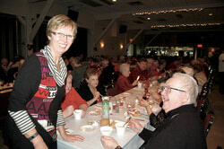 MP Nycole Turmel with guests at the Seniors’ Dinner at the Aydelu center February 14.  Earlier this year, MP Turmel sent out a Senior’s Resource Guide, which includes information about health services, to her 
constituents.