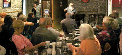Roger Blanchette spoke to a crowded Le Maçon on the history of local education
August 17. Photo: Samuel Poirier