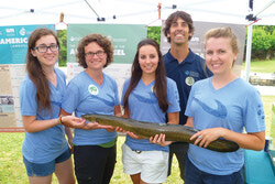 Staff from the Canadian Wildlife Federation and the Ottawa Riverkeeper with an eel sculpture. According to the Canadian Wildlife Federation, the presence of eels throughout all tributaries to Lake Ontario and the St. Lawrence River has decreased by almost 90% since 2006. 
Photos: Ottawa Riverkeeper