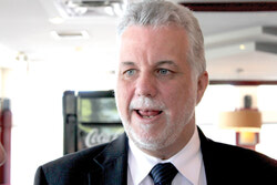 Quebec Premier Philippe Couillard supporting Minister of Education Sébastien Proulx. 	Photo: Laurent Robillard-Cardinal