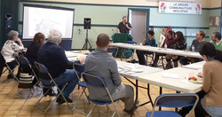 Photo: President of the Deschênes
Community Centre (speaker in photo)
with The Outaouais Hunger and Social
Development Concertaion Table
November 12 discussing options for local
food production. (LR)
