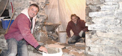 Today two stone masons from the Balkans, Devor and Bora Lakic, are responsible for restoring the more than century-old stone.   	Photo: LRC